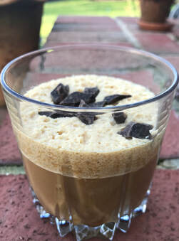 ​Skip Starbucks and enjoy this easy, homemade Iced Caramel Shake! Throw everything into the blender, and sprinkle with chocolate chips.  1. In a blender, add 1 cup almond milk, 2 shots espresso, 4 tbsp caramel sauce*, and 2 tsp vanilla extract. 2. Add 1 cup ice. 3. Blend, top with chocolate chips, and enjoy!  Serves 2.  *Adjust to taste.